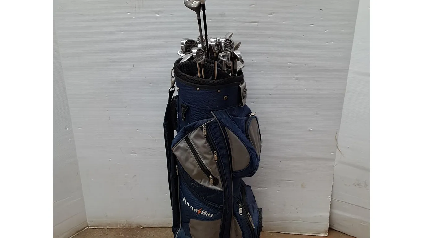 *Powerbilt Golf Club Bag & (16) Golf Clubs of Various Types - As Is, Pickup Only