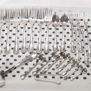 Selection of Birks sterling silver flatware including seven dessert forks, five pickle forks, sauce