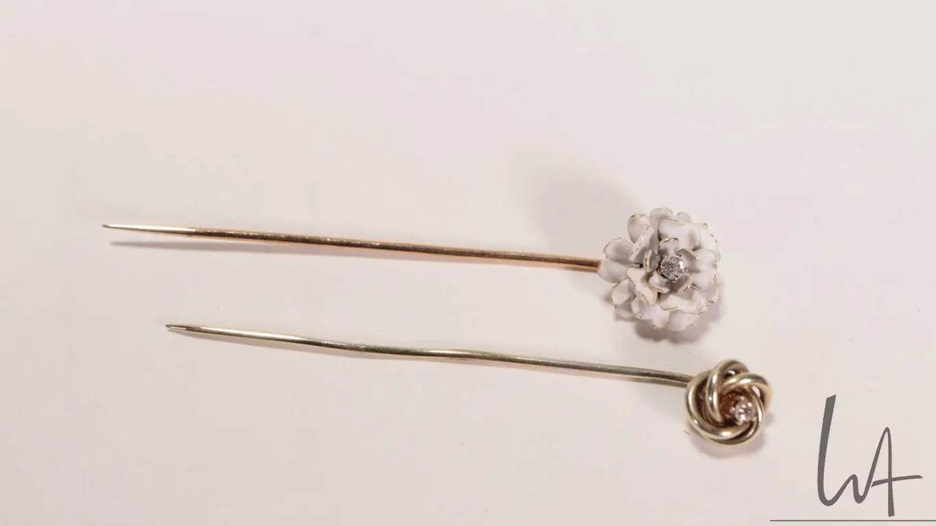 Two antique/ vintage 14kt yellow gold stick pins including enamel rose set with small genuine diamon