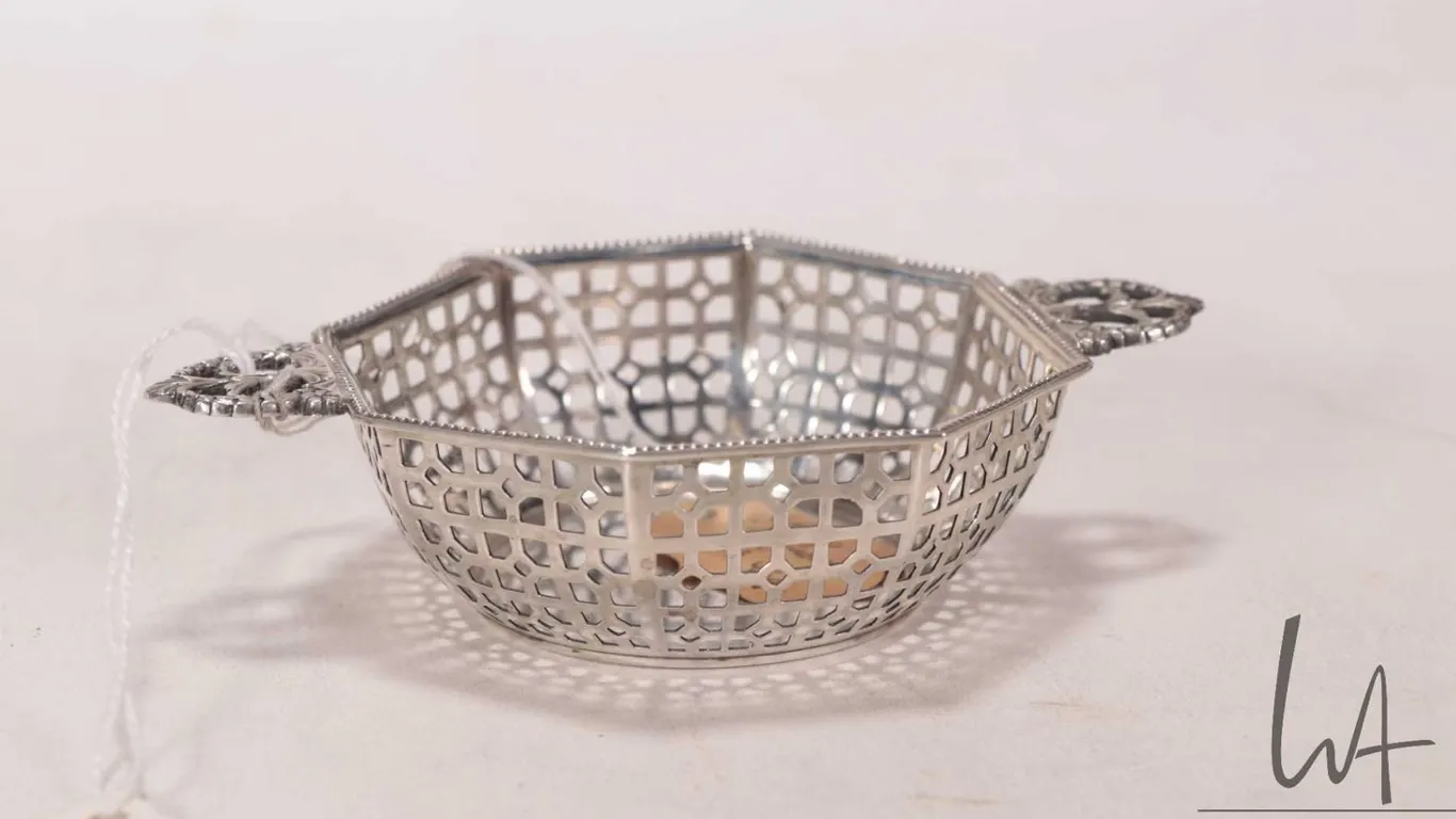 Antique Mappin & Webb Ltd. sterling silver, double handled pierced dish, with British sterling hallm