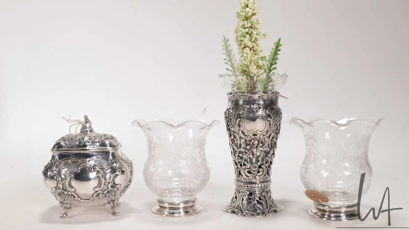 Selection of antique collectibles including small German silver repousse decorated silver lid casket