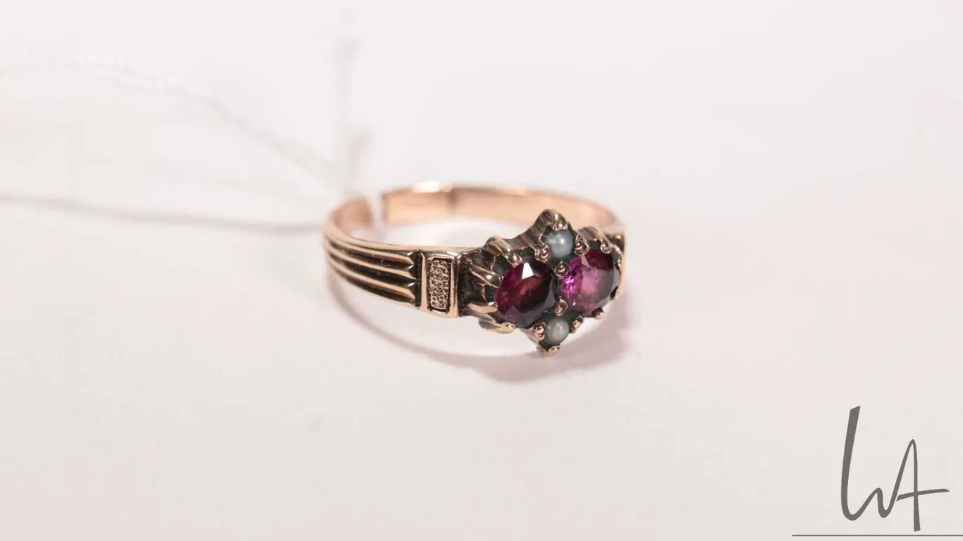 Antique tested 10kt yellow gold ring set with two amethyst gemstones and seed pearls, size 7