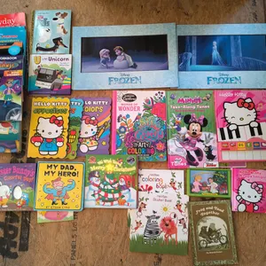 Various Children's Books & Frozen Wall Art