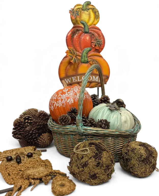 Autumn-Themed Basket With Pinecones, Decorative Pumpkins, and Accents