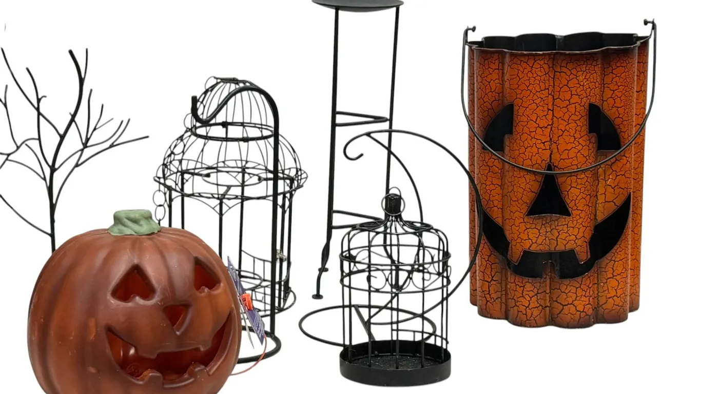 Halloween Decor Including Jack-o'-Lanterns and Metal Stands