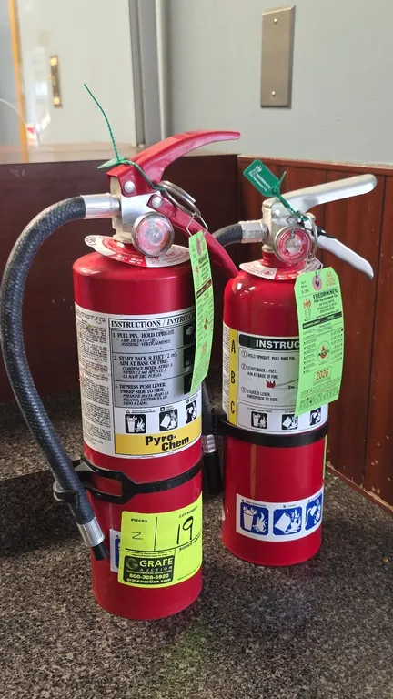 Pyro-Chem and Amerex dry chemical ABC fire extinguishers. Includes Pyro-Chem PC 5S ABC+2 (S/N: D-03684756) and 2018 Amerex B402 (S/N: F-50554084). Fea