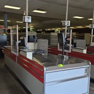 Borroughs Series 80 dual belt checklane. Features dual motorized conveyor belts, stainless steel decking and trim, cashier workstation with undercount