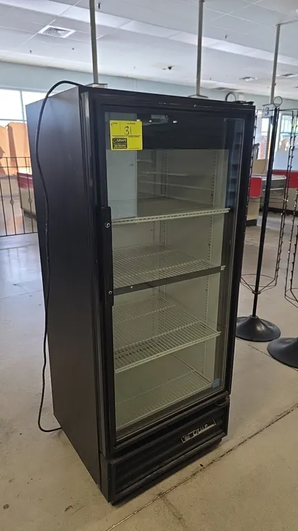 True GDM-10-58-LD self-contained single glass door display cooler. Features LED interior lighting, adjustable wire shelving, and a black exterior fini
