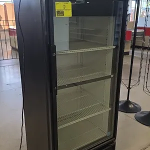 True GDM-10-58-LD self-contained single glass door display cooler. Features LED interior lighting, adjustable wire shelving, and a black exterior fini