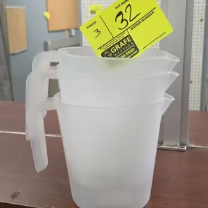 1 qt polypropylene pitchers. Features translucent plastic construction, molded open-loop handles, and integrated pour spouts.
