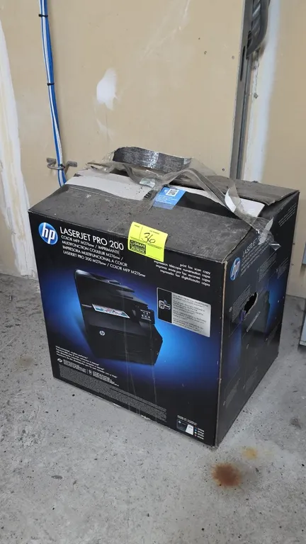 HP LaserJet Pro 200 Color MFP M276nw all-in-one color laser printer. Features print, fax, scan, and copy functions, touchscreen display, and wireless
