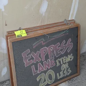 Wood frame dual-sided chalkboards. Features dual-sided chalkboard surfaces and attached metal hanging chains. 32" x 24".