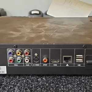 DMX ProFusion iS Model 2010 digital media player. Features front LCD display, Pandora internet radio capability, navigation controls, HDMI, S-Video, S