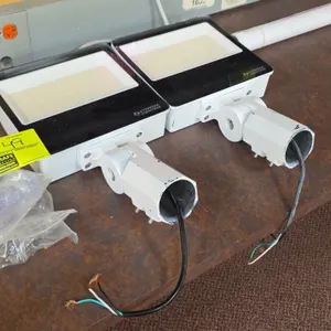 Lithonia Lighting metal LED light fixtures. Features integrated LED arrays, adjustable slipfitter pole mounts, and wiring pigtails. 10". Includes bag 