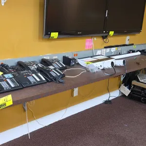 Laminate countertop. Features brown stone-look laminate work surface. Includes metal wall-mounting support brackets. Dimensions: 13'L. Wall-mounted in