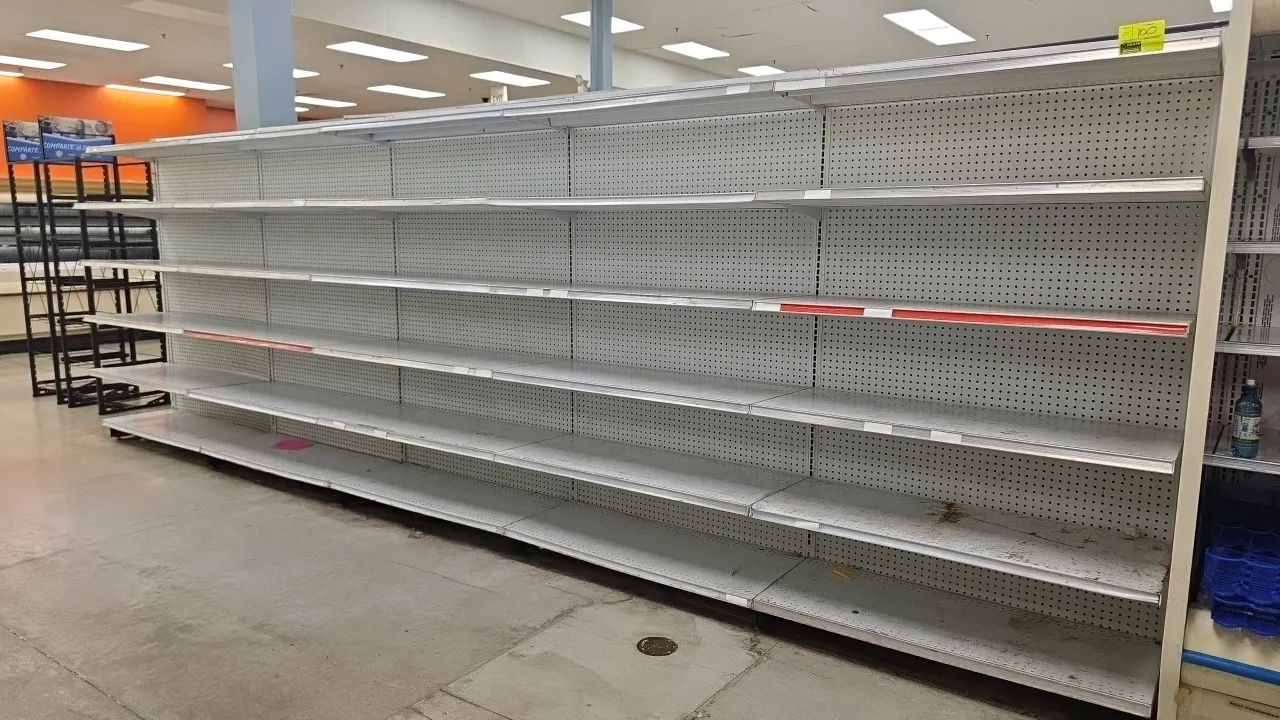 20'L of Madix wall shelving. 80"H uprights with 20"D base shelves. Features pegboard backing and adjustable upper shelves. Note: Sold by the foot.