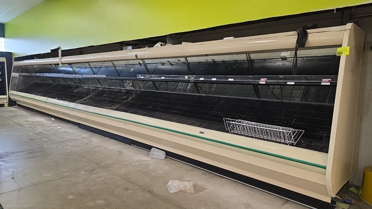 Hillphoenix OHP12 multi-deck open display cases. Features wire bottom rack shelving, mirrored interior panels, and green protective bumper trim. Dimen