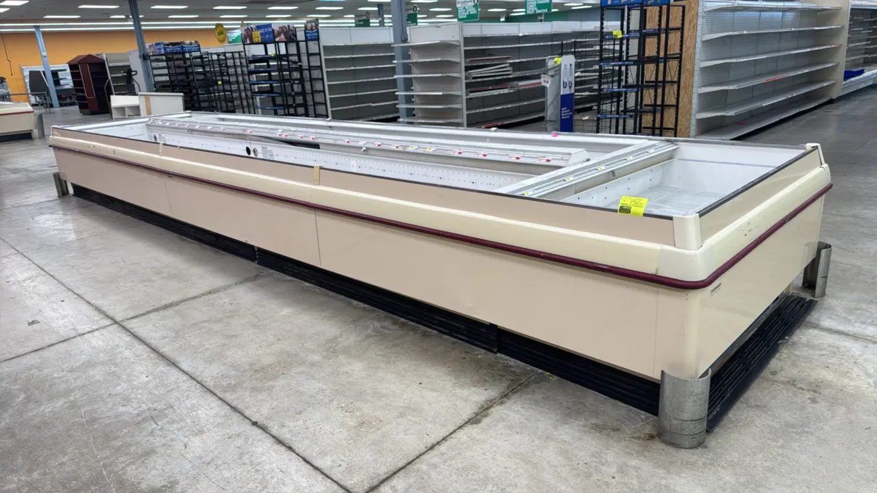 2008 Hillphoenix OWIZ low-temp double-wide island display cases. Features wire rack shelving, center divider with bumper rails, corner guards, and ele