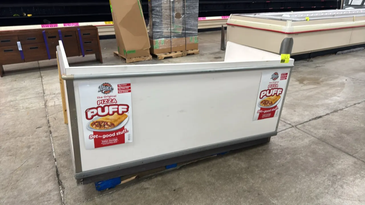 Laminate prep table. Features white laminate finish, three-sided containment wall, protective front bumper rail, and lower open storage shelving. 72"