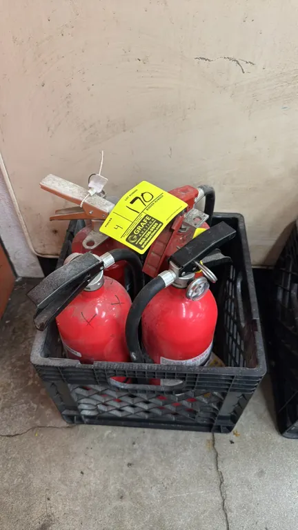 Various dry chemical fire extinguishers with crate. Includes (4) portable dry chemical fire extinguishers equipped with pressure gauges and discharge