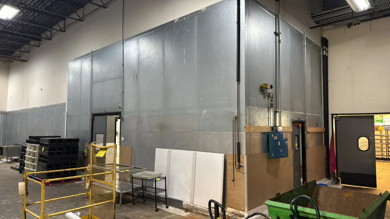 Eliason walk-in cooler combo. Features 3' x 7' single and 6' x 8' double poly swing door entrances with vision panels, ceiling-mounted evaporator coil