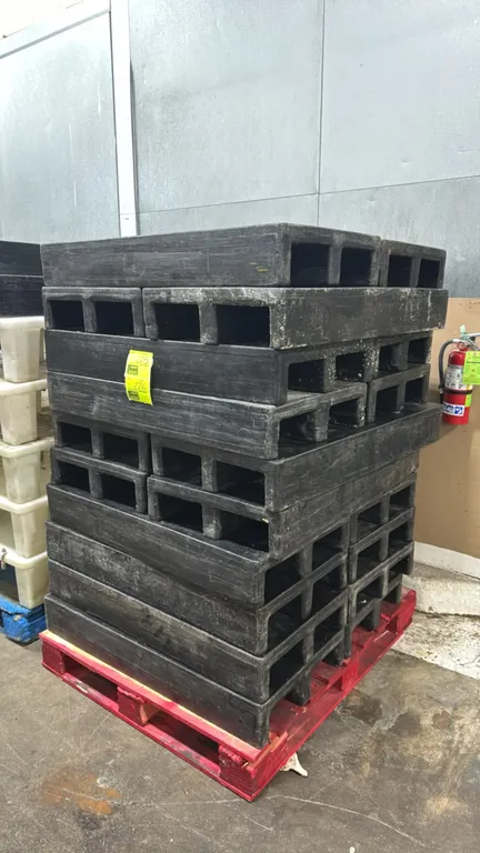 Polyethylene dunnage racks. Features heavy-duty molded plastic construction with perforated top decks. 40" x 20" each. Note: Base pallet not included.