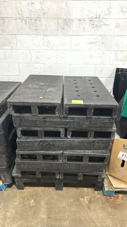 Poly dunnage racks. Features molded polyethylene construction with solid and slotted top designs and black finish. 20" x 40" each.