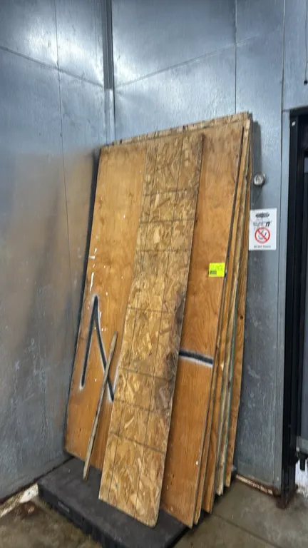 Package lot of various plywood and OSB sections. Includes assorted full and partial sheets of plywood and oriented strand board (OSB). Features spray