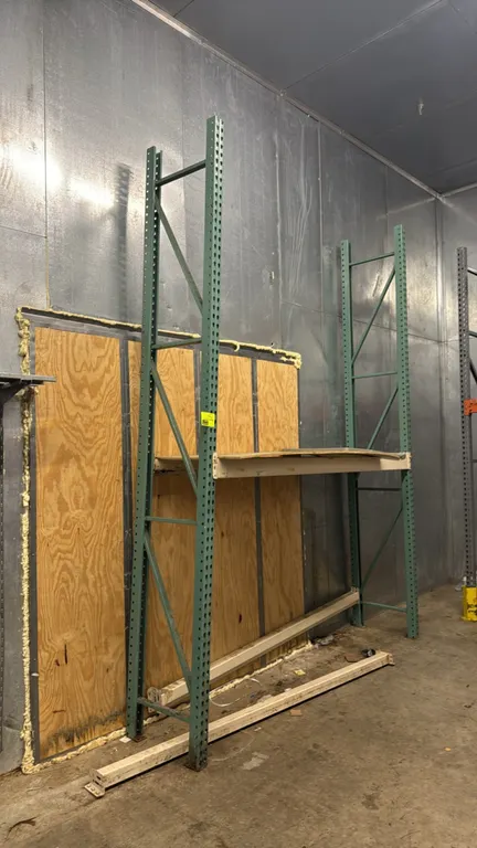 8'L of teardrop pallet racking. Includes (2) 2'D x 12'H uprights, 4-1/2" cross beams, and wood decking.
