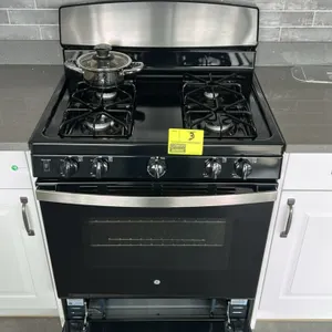 GE Appliances JGBS30RET1SS 4-burner freestanding gas range. Features stainless steel and black finish, 4 sealed gas burners with cast grates, front co