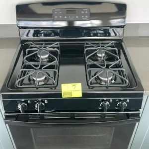 GE JGB635DEK5BB 4-burner freestanding gas range. Features a digital control panel, self-cleaning oven, black finish, and two interior racks. 30"W. S/N