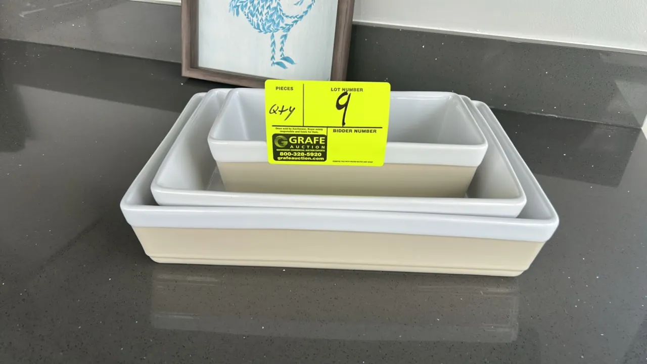 Assorted smallwares and home decor. Includes (3) nesting rectangular serving dishes, assorted ceramic dinnerware (plates, bowls, and mugs), (2) champa