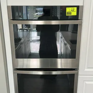 GE JTD3000SN2SS smart built-in double wall oven. Features stainless steel finish, glass viewing windows, digital touch controls, and interior wire rac