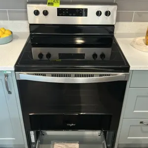 Whirlpool WFE505W0JS3 freestanding electric range. Features stainless steel finish, smooth ceramic glass cooktop with dual element and warm zone, digi