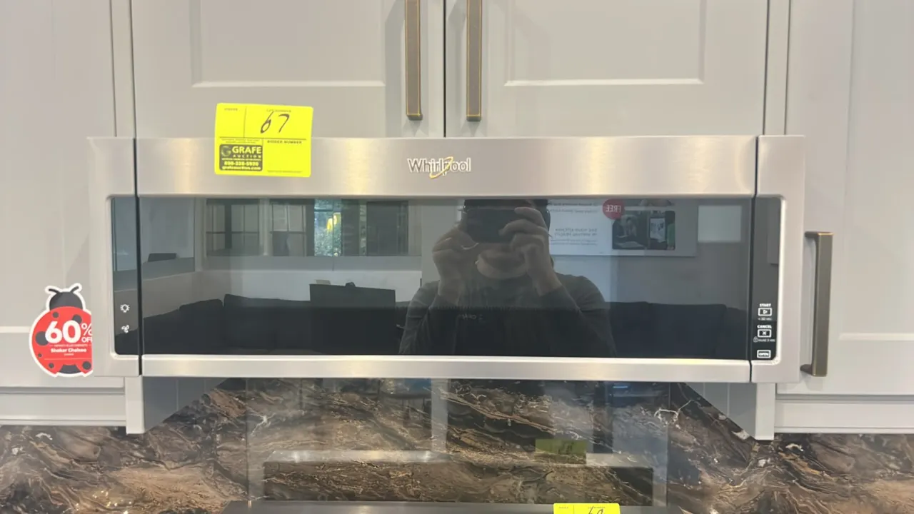 2023 Whirlpool WML75011HZ10 low-profile microwave hood combination. Features stainless steel finish, glass turntable, interior digital touch controls,