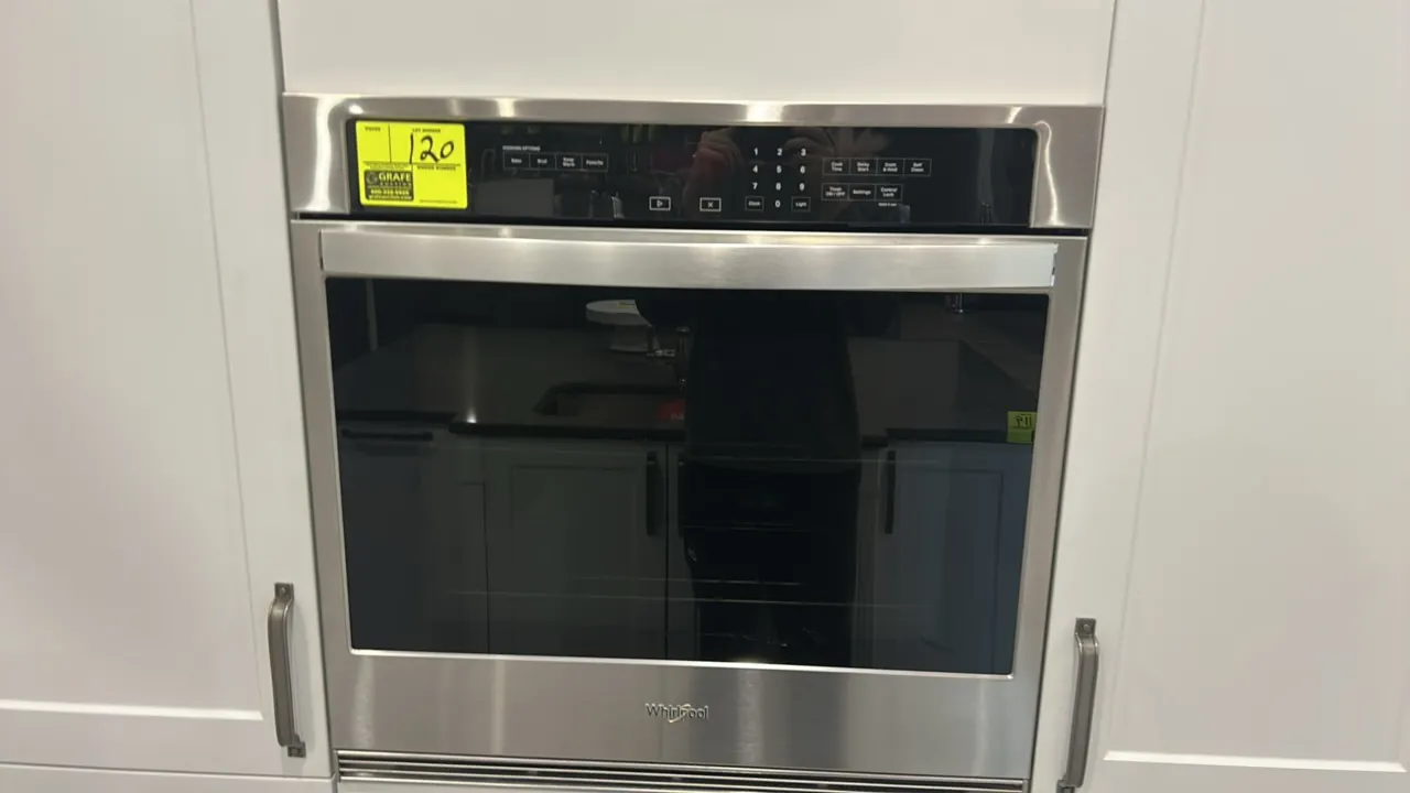 Whirlpool WOS31ES0JS20 built-in single electric wall oven. Features stainless steel finish, digital touch control panel, glass door, and two oven rack