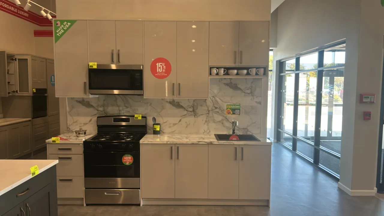Infinity Plus laminate kitchen cabinet set. Includes upper and lower high-gloss cabinets, faux marble laminate countertop, drop-in Bocchi single-basin