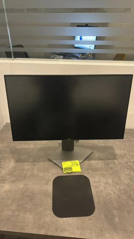 Dell U2720Q 27" flat panel monitor. Features an adjustable desktop stand. 27" screen. Electrical: 240V. Desk and background items not included.