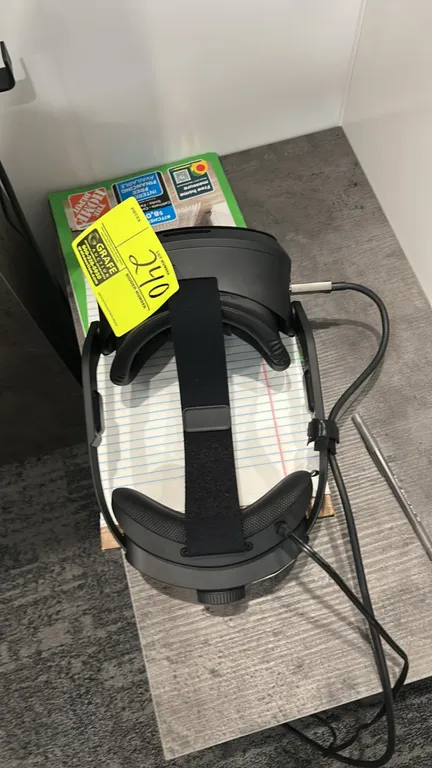HTC Vive Focus Vision mixed reality and PC VR headset. Features front tracking cameras, adjustable rigid head strap with rear dial, top support strap,