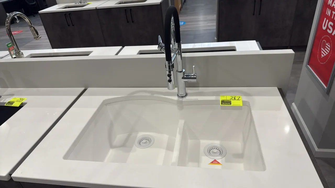 Blanco 33" 2-bowl 60/40 composite dual mount kitchen sink with chrome pull-out faucet. Features white composite construction, 60/40 split basin, and m