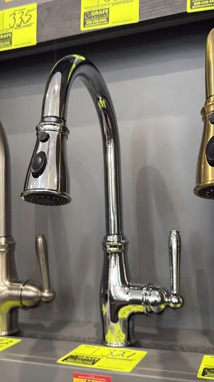 Danube pull-down kitchen faucet. Features a polished chrome finish, high-arc gooseneck spout, single-lever handle, and multifunction pull-down spray h