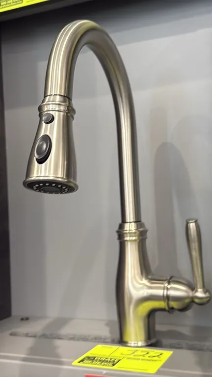 Danube pull-down kitchen faucet. Features a stainless steel finish, high-arc gooseneck spout, single-lever handle, and pull-down spray head with dual-