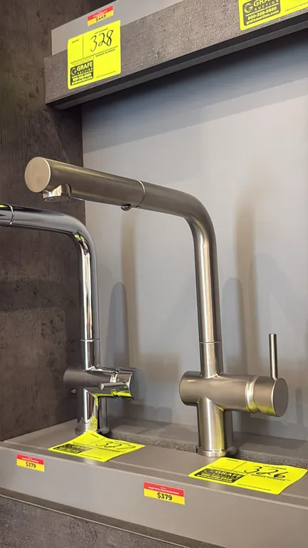 Ganges FA.PAI.01.005 pull-out faucet. Features a brushed nickel finish, single-handle lever control, and pull-out spray head. Note: Display mount and
