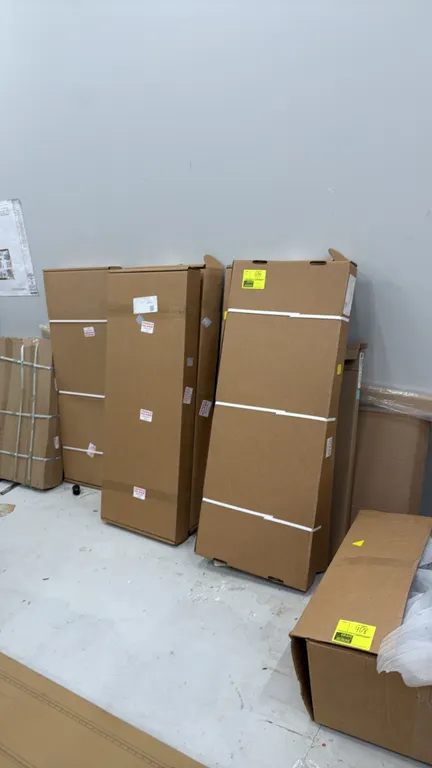 Assorted cabinet parts and components. Includes boxed items such as a 17-5/8" x 40-3/8" x 3/4" loose shelf (SKU: KS.0446.1026.009.LV) and a 28-7/8" x