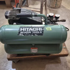 HITACHI 4 GAL. AIR COMPRESSOR.