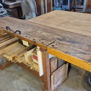 Solid wood work table with vise and hold down holes