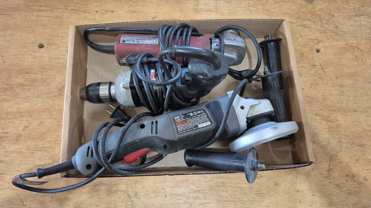 TWO ANGLE GRINDERS AND DRILL