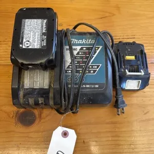 Makita battery charger with two batteries.
