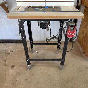 Woodworking Router Table with Electric Router.