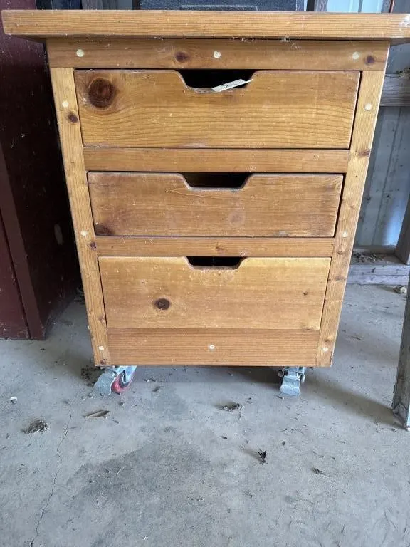 Wooden stand with drawers.